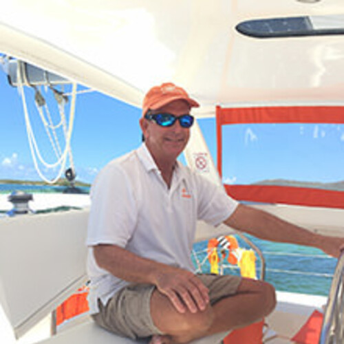 Photo of Capt Sam at the helm 